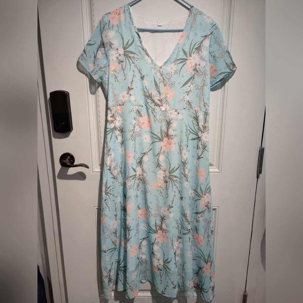 Women's size large sheer dress with sewn in slip side zipper